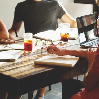 Team working together around a table